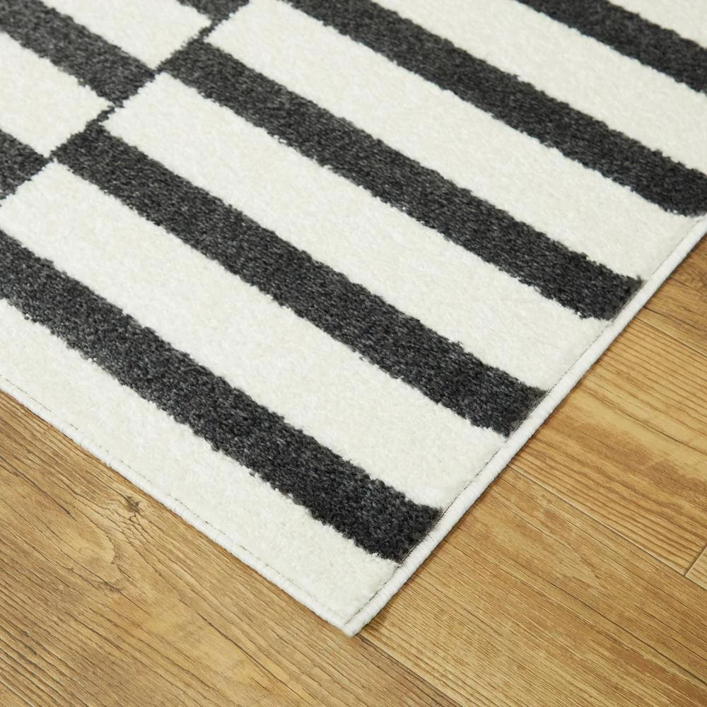 Dewey Striped Black 5 ft. x 7 ft. Area Rug by BALTA 6 Dewey Striped Black 5 ft. x 7 ft. Area Rug by BALTA - Image 4