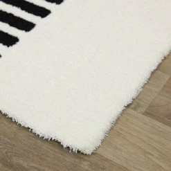 Mathilde Black 5 ft. 3 in. x 7 ft. Striped Area Rug by BALTA -Cheap BALTA || Norsk Store black balta area rugs 3098848 4f 1000